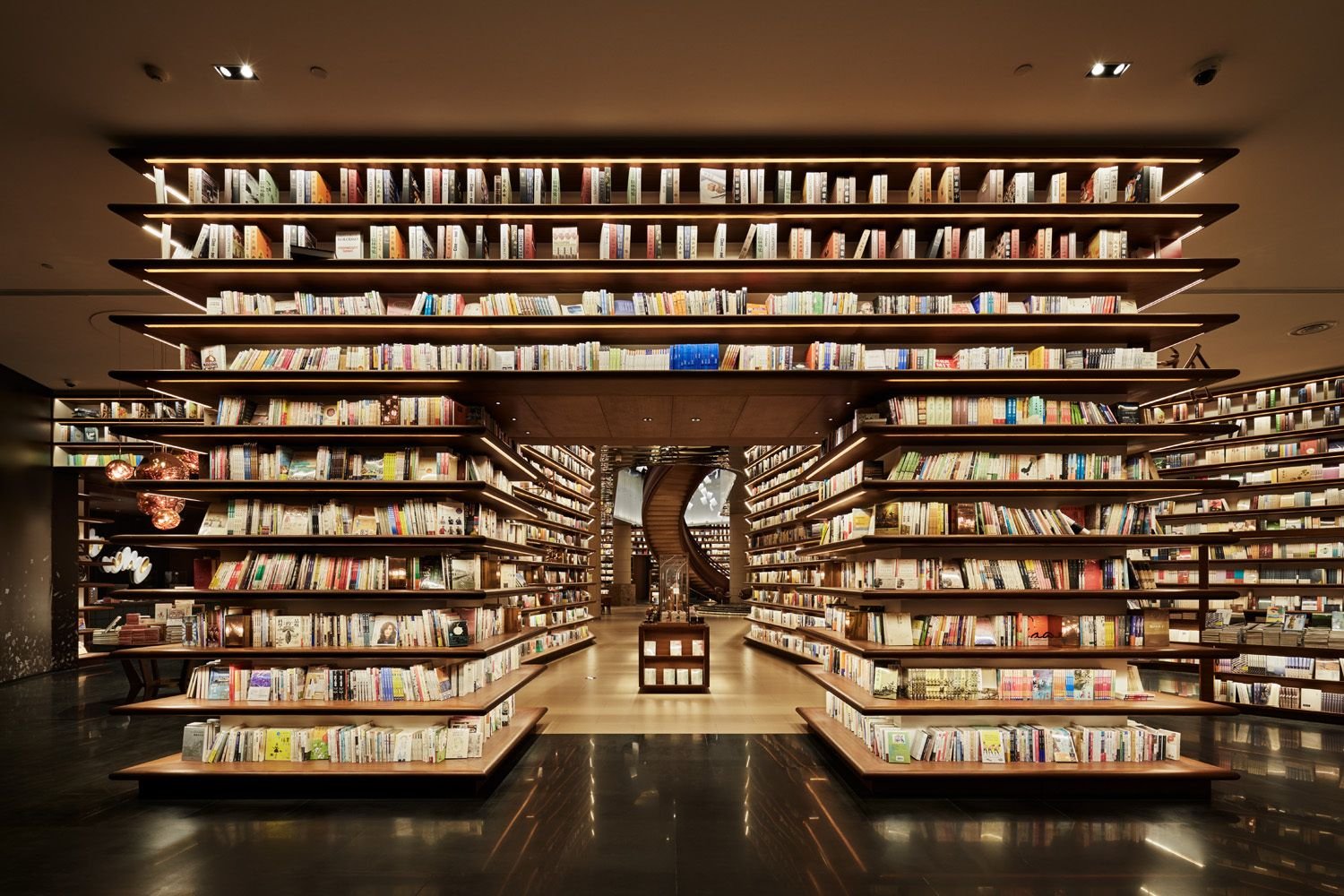 Attachment library. Книжный магазин. Современный книжный магазин. Книжные полки в магазине. Современная библиотека.