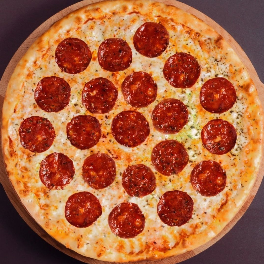 половина из четырех пицц пепперони хорошая пицца отличная пицца фото 23